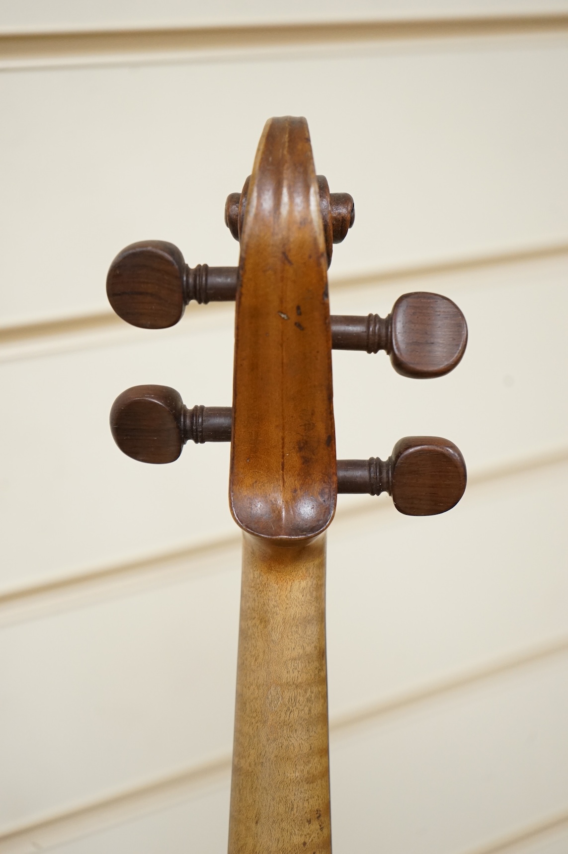 A late 18th century cased English violin, possibly after Richard Duke, length of body 35.5cm.
